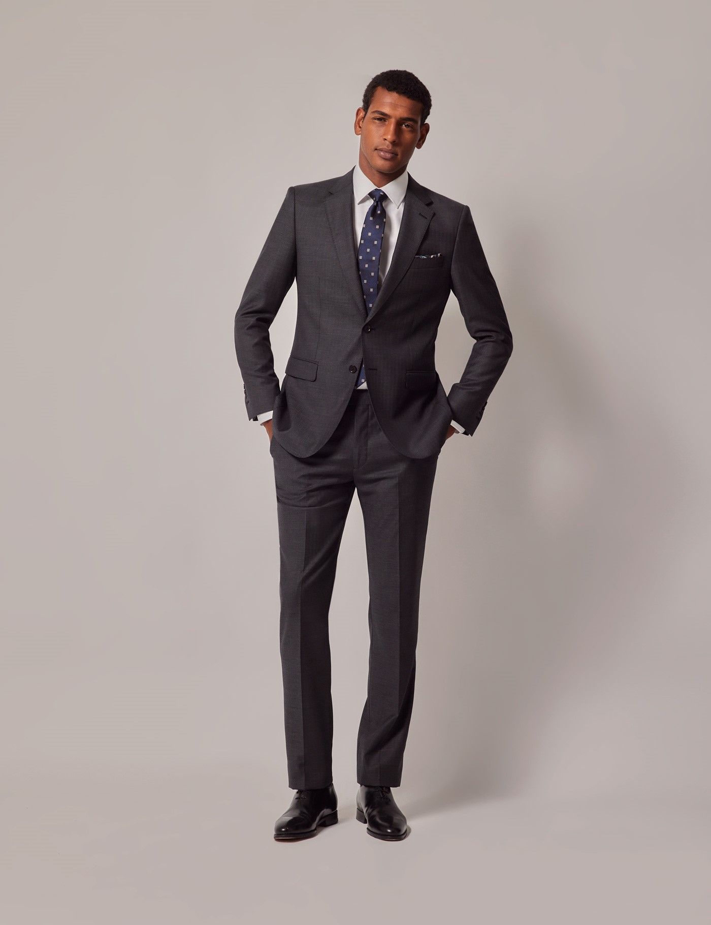 Men's Charcoal Herringbone Wool Slim Fit Suit| Hawes and Curtis